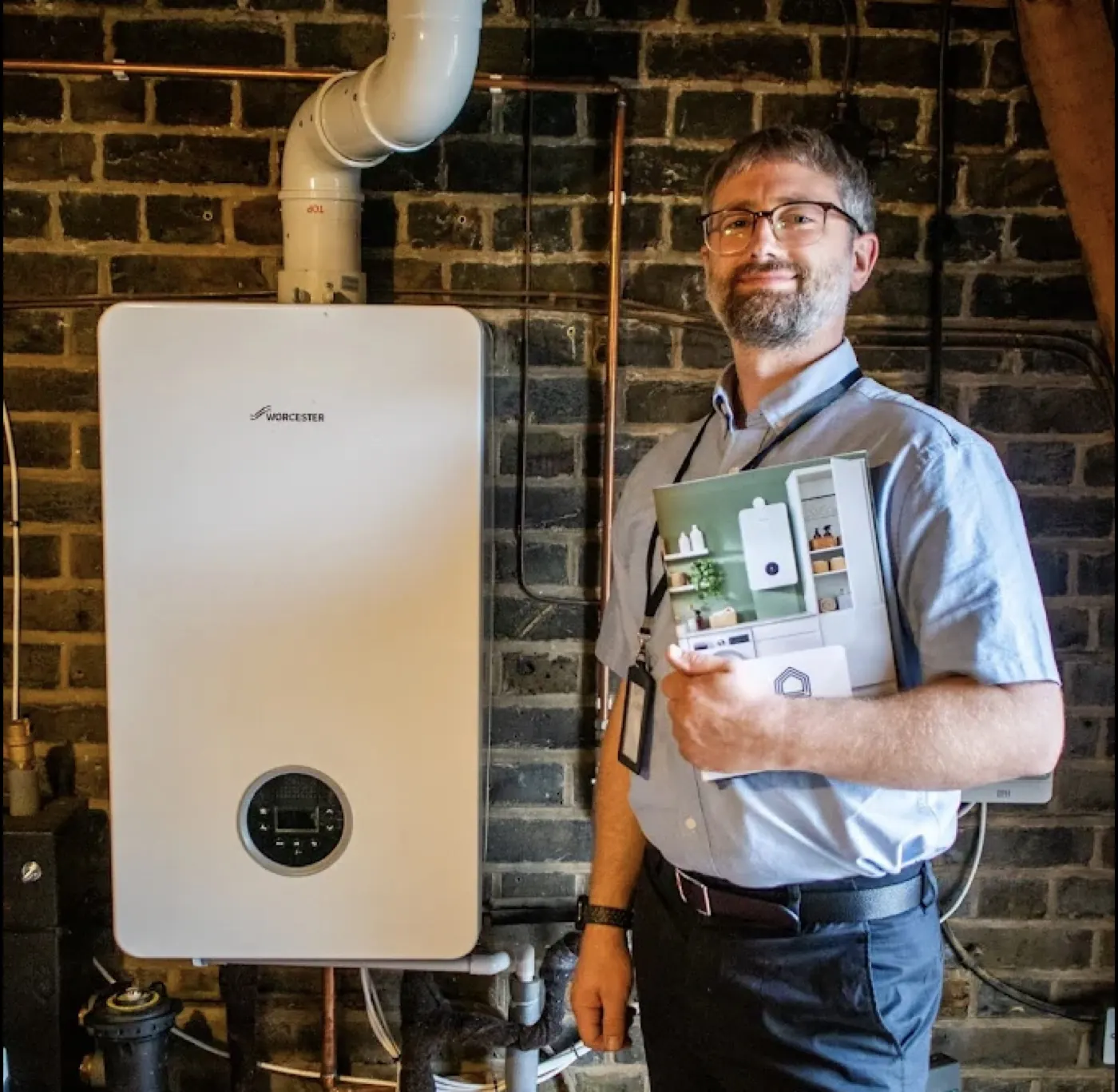 A Drake Gas Safe engineer with a newly installed Worcester Bosch boiler